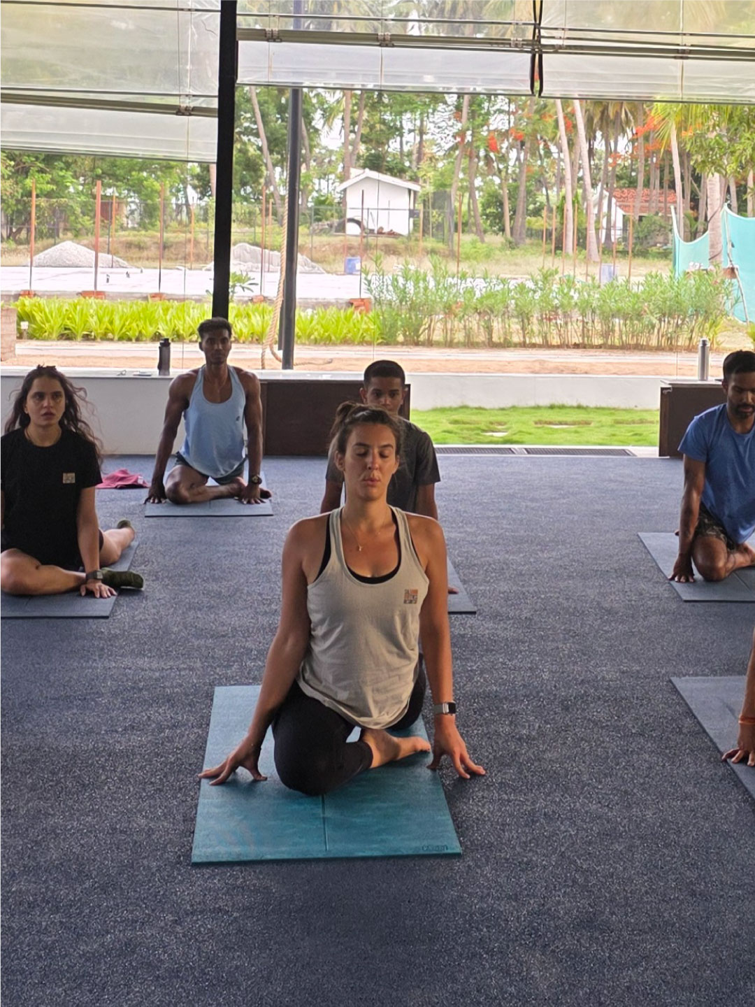 Morning yoga session in open-air studio at Sol Fitness Resorts