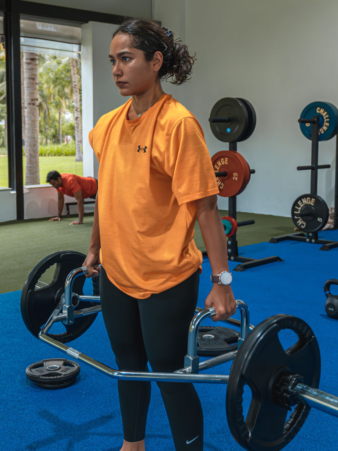 Guest preparing for deadlift at Sol Fitness outdoor training area